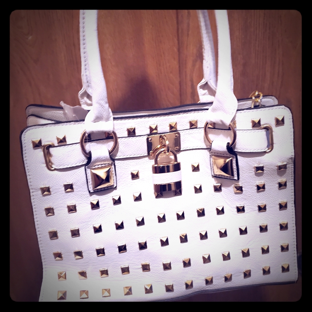White with gold stud purse
